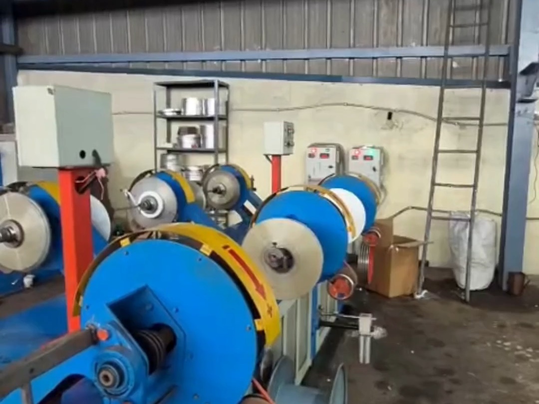 The poly taping line at Lahotiraj Metals, Bhilwara